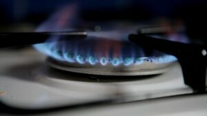 stock-footage-igniting-lighting-a-gas-hob-on-an-oven-stove
