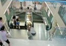 Woman dies in escalator fall after saving son