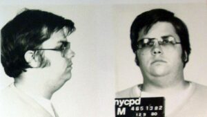 A mug-shot of Mark David Chapman, who shot and killed John Lennon, is displayed on the 25th anniversary of Lennon's death at the NYPD in New York December 8, 2005. Chapman is currently imprisoned at Attica State Prison in New York, serving a 20-year-to-life sentence after pleading guilty to 2nd degree murder. ??? USE ONLY